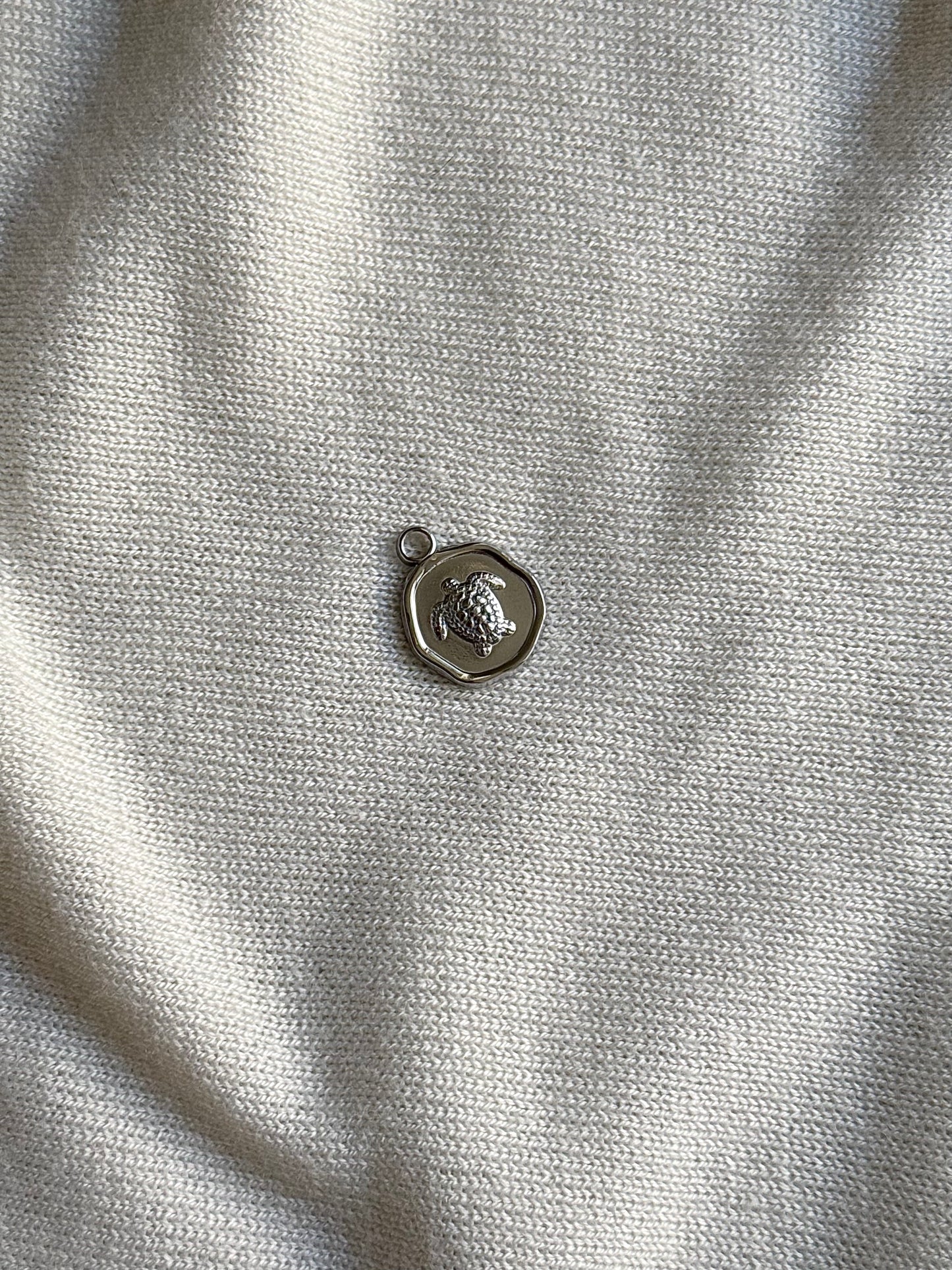 Médaille tortue